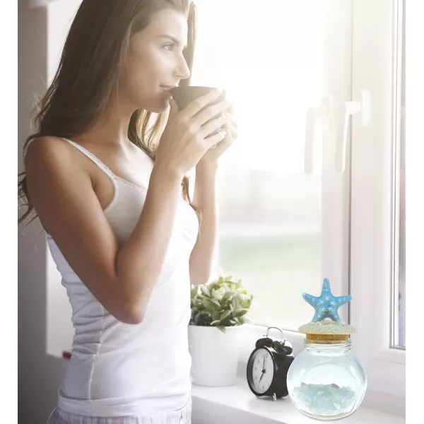 CoTa Global Turquoise Starfish Nautical Glass Bottle with Crystal Rocks and Shells  Decorative Bottle with Fixed Starfish Lid Jar Topper Glass Jar for Beach Home Decor Starfish Souvenir 7x4 Inch