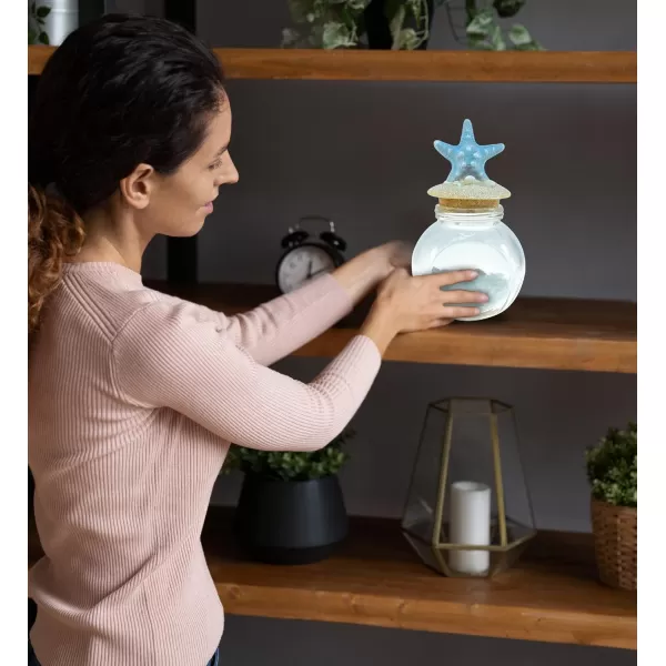 CoTa Global Turquoise Starfish Nautical Glass Bottle with Crystal Rocks and Shells  Decorative Bottle with Fixed Starfish Lid Jar Topper Glass Jar for Beach Home Decor Starfish Souvenir 7x4 Inch