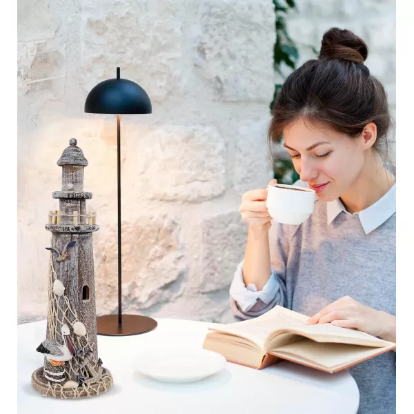 CoTa Global Brown Wooden Lighthouse Decor  Handcrafted Nautical Lighthouse Table Top Centerpiece with Pelican  Fishing Net Seashells and Anchor Decor Lighthouse Outdoor Decor  1425 Inches