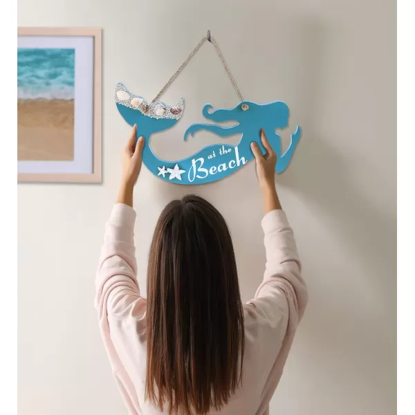 CoTa Global Aqua Sky Wall Decor Mermaid Hanging Sign  Handmade and Crafted Wooden Mermaid Sign with Rope for Hanging Nautical Themed Home Decor  Handmade Color May Vary
