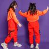 imageRolanko Girls Cargo Pants for Kids Loose Streetwear Hip Hop Dance Cotton Cargo Jogger Pants for Kids 415 YearsOrange