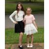 imageRolanko Girls Boho Lace Skorts Flowy Ruffle Tiered Crochet Mini Skirts with Builtin ShortsWhite