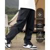 imageRolanko Boys Girls Cargo Pants Quick Dry Lightweight Elastic Waist Kids Trousers with Pockets for Sports OutdoorBlack