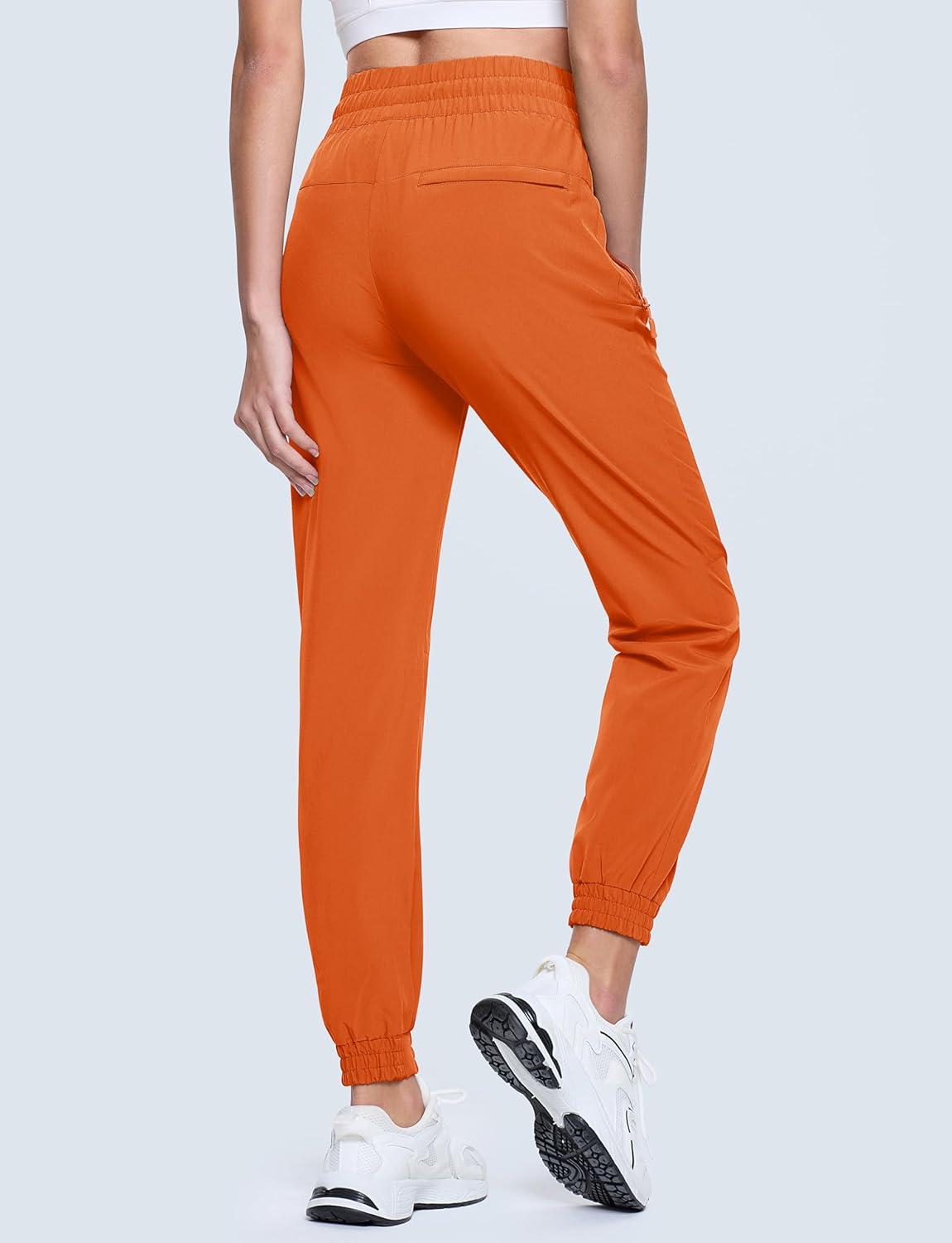 imageMAGCOMSEN Womens Hiking Pants Lightweight Quick Dry Water Resistant Joggers with Pockets Athletic Travel OutdoorOrange