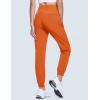 imageMAGCOMSEN Womens Hiking Pants Lightweight Quick Dry Water Resistant Joggers with Pockets Athletic Travel OutdoorOrange