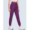 imageMAGCOMSEN Womens Hiking Pants Lightweight Quick Dry Water Resistant Joggers with Pockets Athletic Travel OutdoorPurple Red