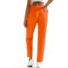 imageMAGCOMSEN Womens Hiking Pants Lightweight Quick Dry UPF 50 Water Resistant Elastic Waist Golf Travel Pants Zip PocketsOrange