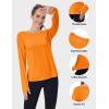imageMAGCOMSEN Womens Long Sleeve Shirts UPF 80 Quick Dry Athletic Workout Tee Shirts with Thumb Holes Rash Guard Swim TopsNeon Orange