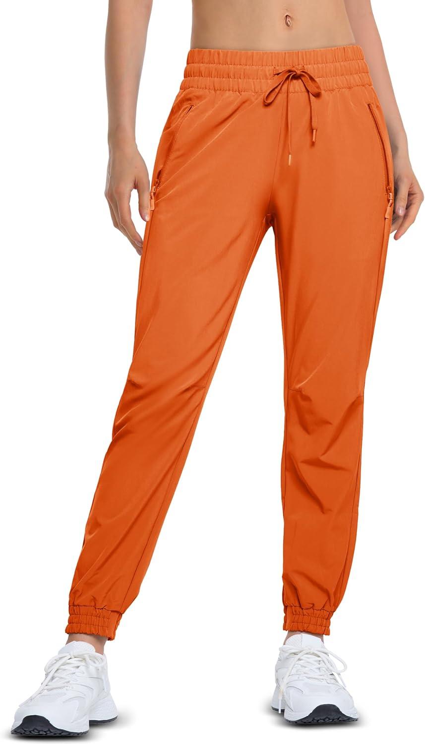 imageMAGCOMSEN Womens Hiking Pants Lightweight Quick Dry Athletic Running Joggers with Pockets Outdoor Travel SweatpantsOrange