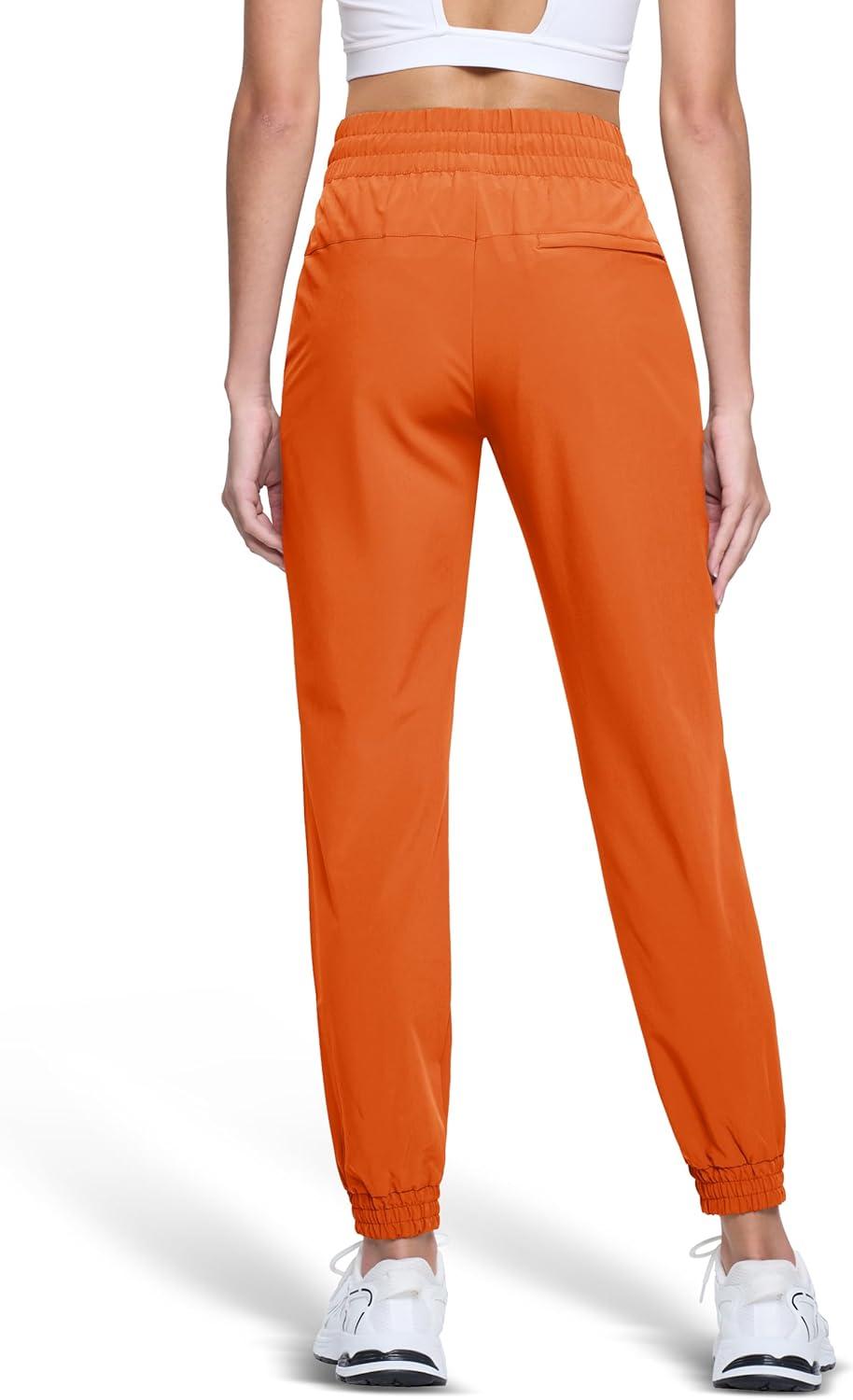 imageMAGCOMSEN Womens Hiking Pants Lightweight Quick Dry Athletic Running Joggers with Pockets Outdoor Travel SweatpantsOrange