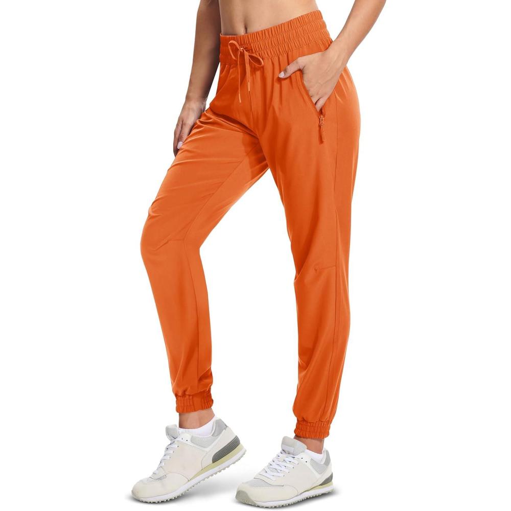 imageMAGCOMSEN Womens Hiking Pants Lightweight Quick Dry Athletic Running Joggers with Pockets Outdoor Travel SweatpantsOrange