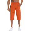 imageMAGCOMSEN Mens Capri Shorts Quick Dry Below Knee 34 Capri Pants with Zipper Pockets for Workout Running Training SummerOrange