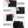 imageMAGCOMSEN Mens Workout Shorts 7 Pockets Quick Dry 34 Capri Pants Zipper Pockets Hiking Athletic ShortsBlack