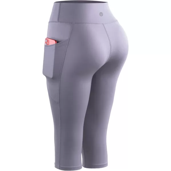 NELEUS Womens Tummy Control High Waist Capri Running Leggings Yoga Pants with Pocket9120 PurpleLight Blue2 Pack