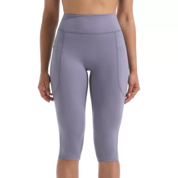 NELEUS Womens Tummy Control High Waist Capri Running Leggings Yoga Pants with Pocket9120 PurpleLight Blue2 Pack