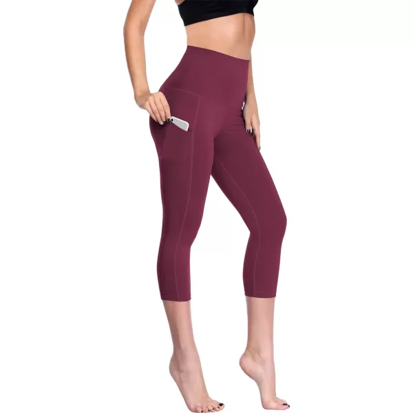 NELEUS Womens Tummy Control High Waist Capri Running Leggings Yoga Pants with PocketZ109 RedBurgundyRose Red3 Pack