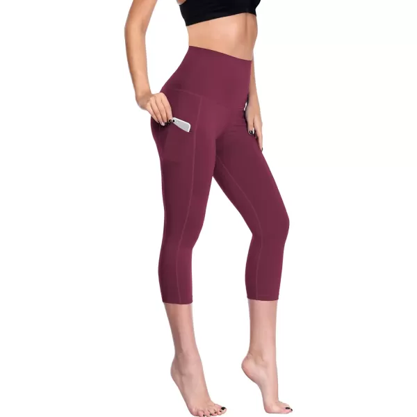 imageNELEUS Womens Tummy Control High Waist Capri Running Leggings Yoga Pants with PocketZ109 RedBurgundyRose Red 3 Pack