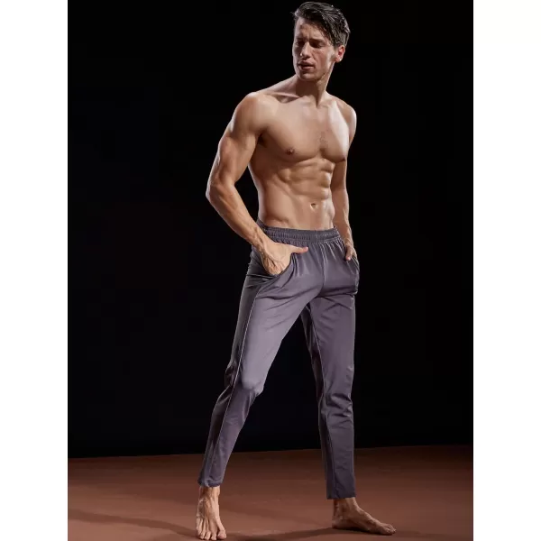 imageNELEUS Mens Workout Athletic Running Tapered Pants7006 2 Pack Black grey