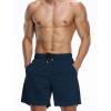 imageNELEUS Mens 7 inch Running Shorts Athletic Gym Workout Shorts with PocketsQ6001 RedNavyBlue 3 Pack