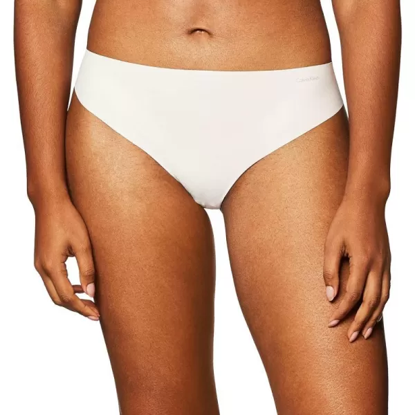 Calvin Klein Womens Invisibles Seamless Thong PantyNymphs Thigh