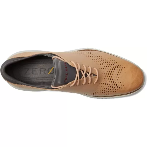 imageCole Haan Mens 2Zerogrand Laser Wingtip OxfordBarely BeigeCity SkylineEgret