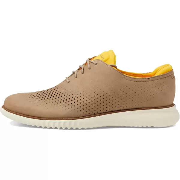 imageCole Haan Mens 2Zerogrand Laser Wingtip OxfordDune NubuckGold FusionIvory