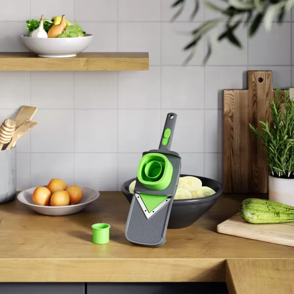 Mueller Handheld Vegetable V Slicer Salad Utensil Perfect for Salad Zucchini Carrots Onions and All Vegetables Make Low CarbPaleoGlutenFree Meals Adjustable ThicknessMueller Handheld Vegetable V Slicer Salad Utensil Perfect for Salad Zucchini Carrots Onions and All Vegetables Make Low CarbPaleoGlutenFree Meals Adjustable Thickness