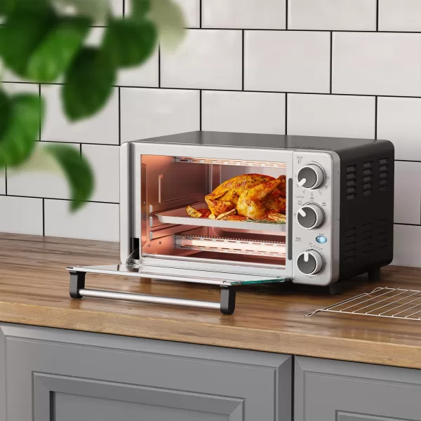 Mueller Toaster Oven with 30 Minute Timer  Toast  Bake  Broiler Settings Stainless Steel Natural Convection Fits 9 inch Pizza 4 Slice Toaster 1100 WMueller Toaster Oven with 30 Minute Timer  Toast  Bake  Broiler Settings Stainless Steel Natural Convection Fits 9 inch Pizza 4 Slice Toaster 1100 W