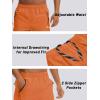 imageTACVASEN Mens Quick Dry Hiking 34 Long Capri Shorts Athletic Workout Running Shorts with Zipper PocketsOrange