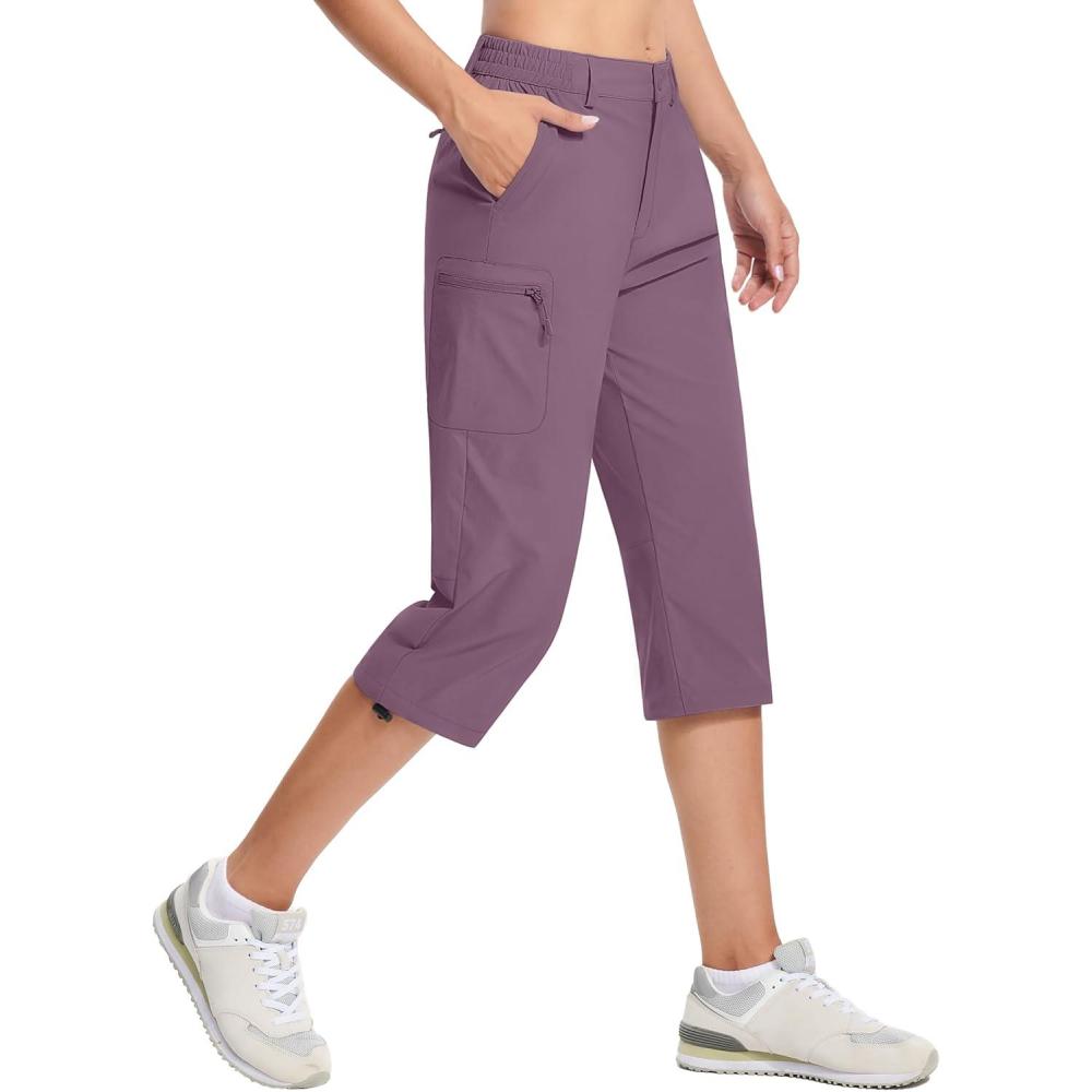 imageTACVASEN Womens Cargo Capris Hiking Pants Lightweight Quick Dry Travel Long Shorts Golf Casual Summer Zipper PocketsLotus Root Pink