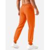 imageTACVASEN Mens Lightweight Athletic Joggers with Zipper Pockets Quick Dry Track Pants for Men Gym Sweatpants Workout GolfOrange