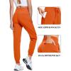 imageTACVASEN Womens Joggers Lightweight Quick Dry Hiking Pants with Pockets Athletic Travel Workout Summer Water ResistantOrange