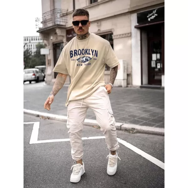 SweatyRocks Men's Letter Graphic Tee Short Sleeve Round Neck Drop Shoulder Top T-Shirt