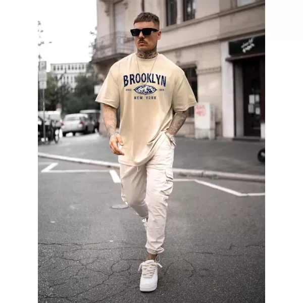 SweatyRocks Men's Letter Graphic Tee Short Sleeve Round Neck Drop Shoulder Top T-Shirt