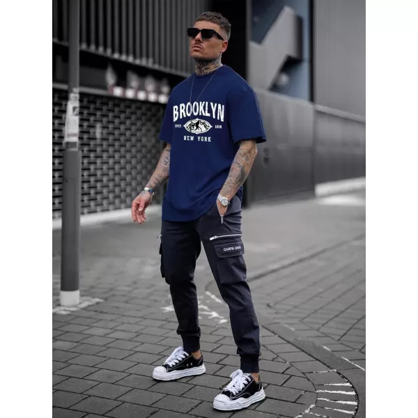 SweatyRocks Men's Letter Graphic Tee Short Sleeve Round Neck Drop Shoulder Top T-Shirt