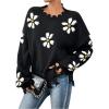 imageSweatyRocks Womens Floral Print Sweaters Long Sleeve Ripped Crewneck Asymmetrical Hem Drop Shoulder Knit Pullover TopsBlack